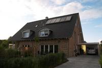 Doppelhaus Unna - Doppelhaushlfte in NRW, Tonnendachgaube mit Zink- Verkleidung, Panoramafenster im Spitzboden, Solar