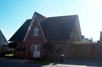 Haustyp Oer-Erkenschwick - Friesenhaus Massivhaus, NRW, Rundbogenfenster, Mauerwerk - Klinker Verzierungen, Trapezgaube