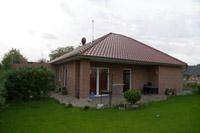 Massivhaus Bungalow Ruhrgebiet NRW, Freisitz, berdachte Terrrasse, massive Garage, Klinkerbau