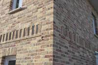 Massivhaus Stadtvilla Unna - Mauerwerk Verzierung - Stadthaus mit 2 Vollgeschossen zum Festpreis