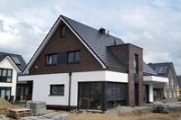 Modernes Architektenhaus Massivhaus, Raffstores, Raffstoren, farbige Fenster, Glattziegel, Klinker Dnnformat