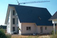 Zweifamilienhaus Ruhrgebiet NRW, Haus mit Einliegerwohnung, Satteldach, Dachschleppe, Ausbauten