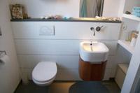 Gste-WC mit Design-Fliesen, Gste Bad, WC im Neubau Massivhaus - zwo ARCHITEKTEN